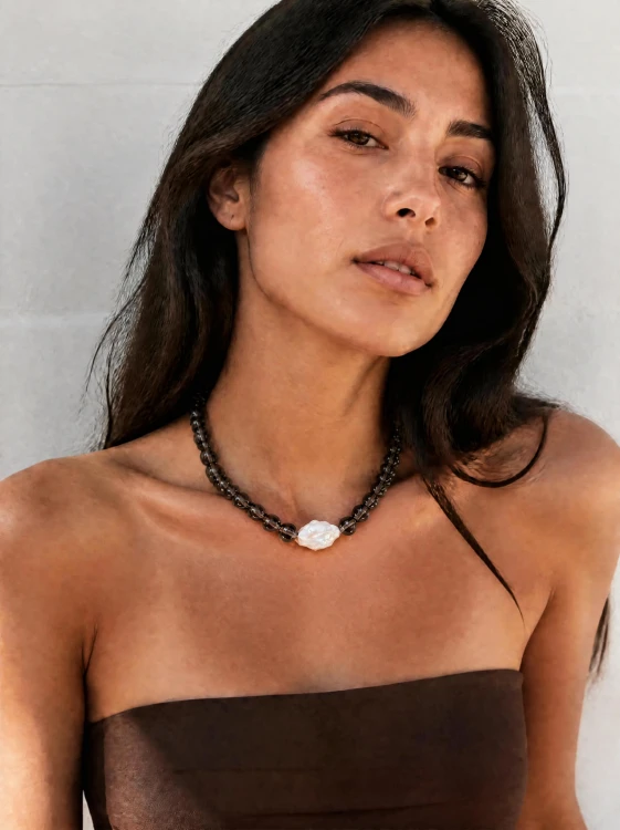 Tanned model wearing necklace.png